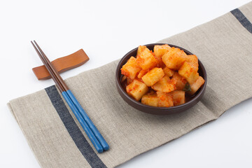 KKakdugi is Korean Radish Kimchi.