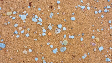 Sandy beach. Coarse sand. Summer beach background. Ecology.