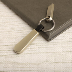 Elegant Keychain on Metal Surface with Close up Detail View