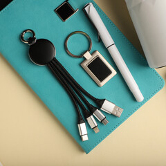 Assorted Promotional Products Set with Notebook, Tumbler, and Accessories. Concept photo shoot.