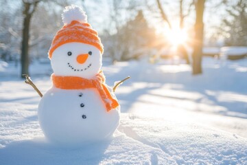 Obraz premium Charming Snowman with Orange Scarf and Hat in Winter Landscape