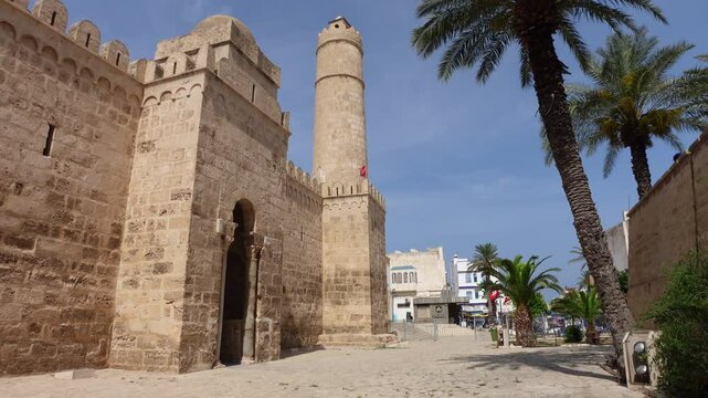Walking towards entrance of impressive Ribat, an ancient Islamic defensive structure located in the historic medina of Sousse in Tunisia
