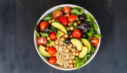 Vibrant salad bowl, rustic wooden table, fresh avocado half, cherry tomatoes, mixed greens, quinoa, colorful vegetables, healthy meal, overhead view, natural lighting