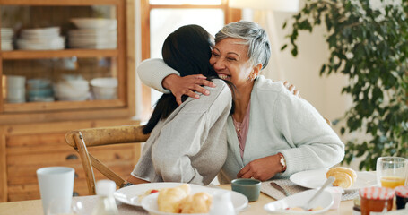 Breakfast, hug and smile with family at home for bonding, nutrition and croissant food. Morning, wellness and health with senior mother and daughter in house for connection, support or brunch