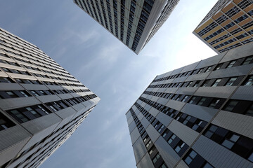 Modern high urban skyscraper buildings view bottom up perspective in the urban cluster set