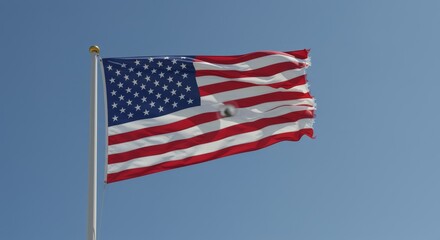 Fototapeta premium Distressed United States Flag Waving Against Azure Sky, symbolizing resilience