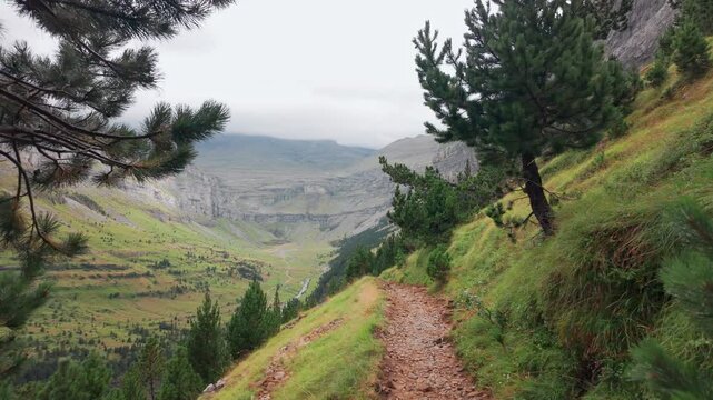 Hiking through Ordesa Valley in Monte Perdido National Park, Spanish Pyrenees.