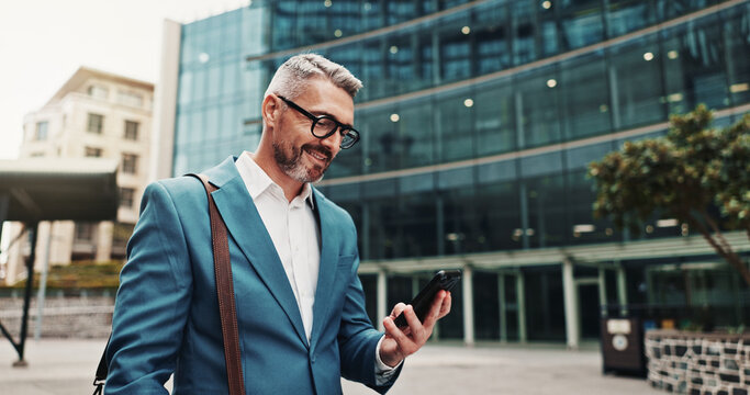 Business man, phone and walking in city for travel with law career, internet or network connection. Mature lawyer online for typing legal advice, mobile app or text contact for plea deal outdoor