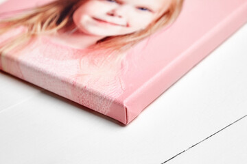 Detailed close-up of a high-quality photo printed on canvas, stretched over a sturdy stretcher bar...
