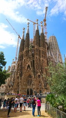  People gathered outside the Nativity facade to the East of the iconic Sagrada Familia
