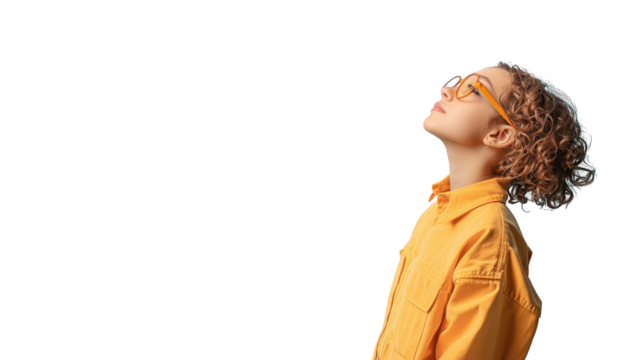 Playful youngster in yellow, a sunny day adventure captured in vibrant portrait