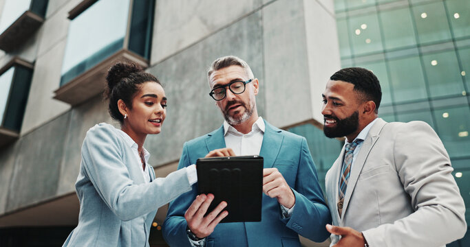Collaboration, city and people with tablet, discussion and real estate agent with website for business. Outdoor, colleagues and group with tech for property, reading and teamwork for market trends - Powered by Adobe