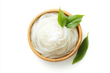 a bowl of noodles with a leaf on top