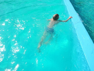 woman swimming in pool