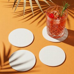 Refreshing Red Cocktail with Rosemary on Orange Background and Blank Coasters