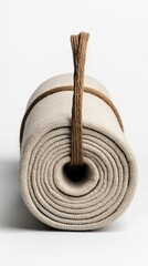 Rolled-up light beige mat with tan cord