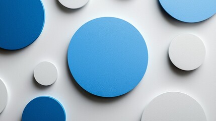 A collection of blue and white circles, with one large blue circle in the center. The circles are arranged in a pattern, with some overlapping and others standing alone. Scene is one of simplicity