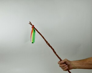 Traditional Czech Easter whip with colored ribbons 
from willow branches in my hand