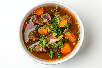 a bowl of stew with carrots and parsley