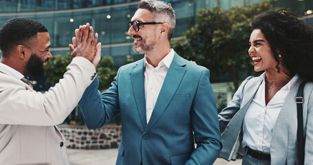 Business people, high five and team outdoor to celebrate success, legal win or deal. Happy men,...