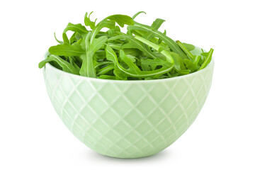 Heap of green fresh rucola or arugula leaf in ceramic bowl isolated on white background