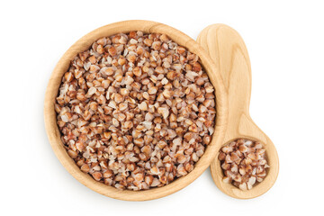 Boiled buckwheat in a wooden bowl isolated on white background. Top view. Flat lay