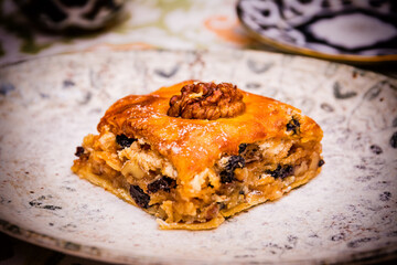 Detail of a portion of baklava, a typical dessert of Asian countries, photographed in Bukhara, Uzbekistan