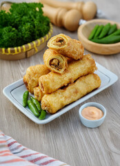 gorengan Indonesia Asian food, fried chicken nuggets with salad with mayonnaise and some spices