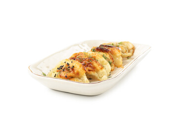 Tasty fried gyoza (dumplings) isolated on white