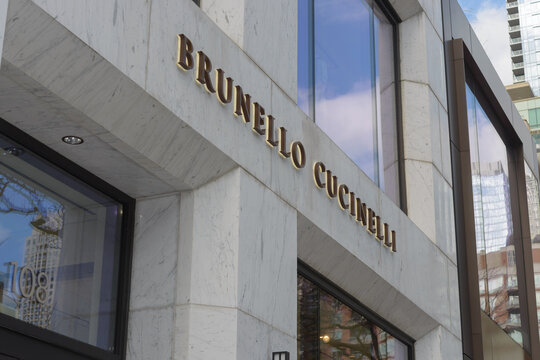 exterior facade and sign of Brunello Cucinelli, a clothing boutique, located at 108 Yorkville Av in Toronto, Canada