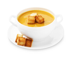 Delicious lentil cream soup with croutons isolated on white