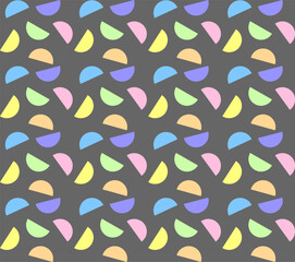 Seamless geometric pattern drawn in pastel colors in the form of multi-colored semicircles on a gray background