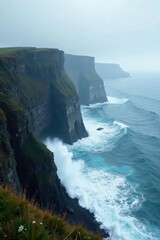 Sea spray and mist on a rugged coastline with towering cliff formations and weathered rocks, fog, water, mist