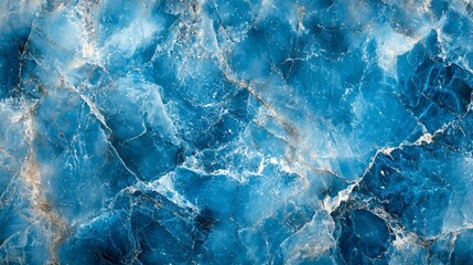 Obraz premium A blue and white marble wall with a blue and white pattern. The blue and white pattern is very intricate and detailed