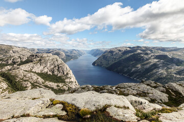 A mountain range in Norway overlooking the Luse Fjord from the Preikestolen side
