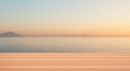 Obraz premium Calming Ocean Sunset Scene with Serene Water and Mountain Horizon Perfect for Tranquil Backgrounds and Relaxing Themes.
