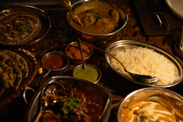 various Indian dishes on the table in plates