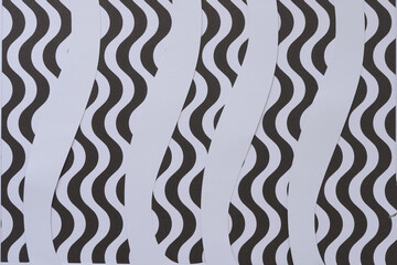 wavy blank paper stripes on black and white paper with tight wavy line pattern