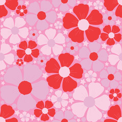 A seamless floral pattern with red and pink flowers on a soft pink background. Elegant, romantic, and feminine, perfect for textiles, wallpapers, gift wrapping, and fashion design.

