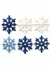 Six elegant snowflakes in varying shades of blue and white