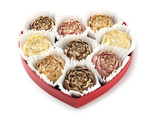 Flower shaped chocolate bonbons in box isolated on white