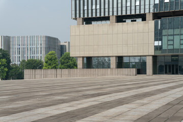 empty concrete ground in front of modern office buildings in downtown. floor for copy space