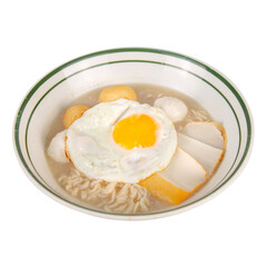 Traditional Hong Kong noodle soup with fish balls, fish cake slices, fried egg, and ramen noodles in clear broth