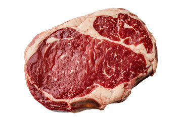 Obraz premium Raw ribeye steak with rich marbling and prominent fat cap on transparent background