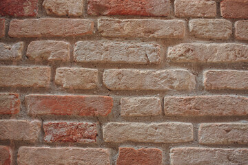 This textured brick wall is ideal for various backgrounds and design applications