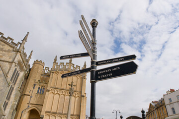 Tourist sign post in Cirencester, UK
