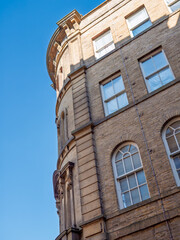 corner of a tall 19th century neoclassical building in the Bradford Little Germany District