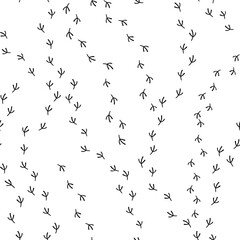 Pigeon footprints isolated on a white background. Seamless pattern. Abstract bird tracks in the snow. Monochrome background for paper, gift wrap, textile, cover, wallpaper.