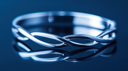 A Reflective Image Of A Shiny Woven Metal Bracelet Display
