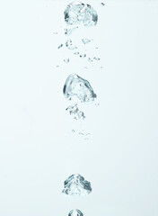 Many water bubbles on light background, closeup. Space for text